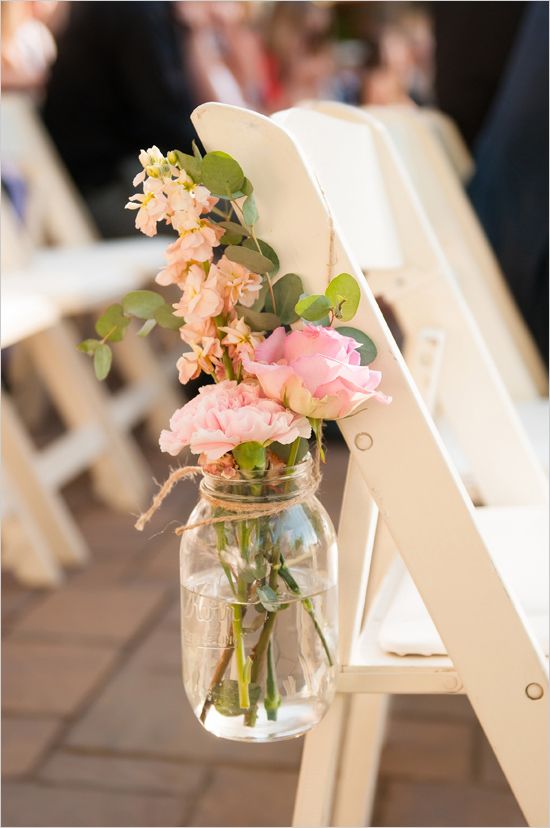 blush pink roses in mason jar wedding chair decor