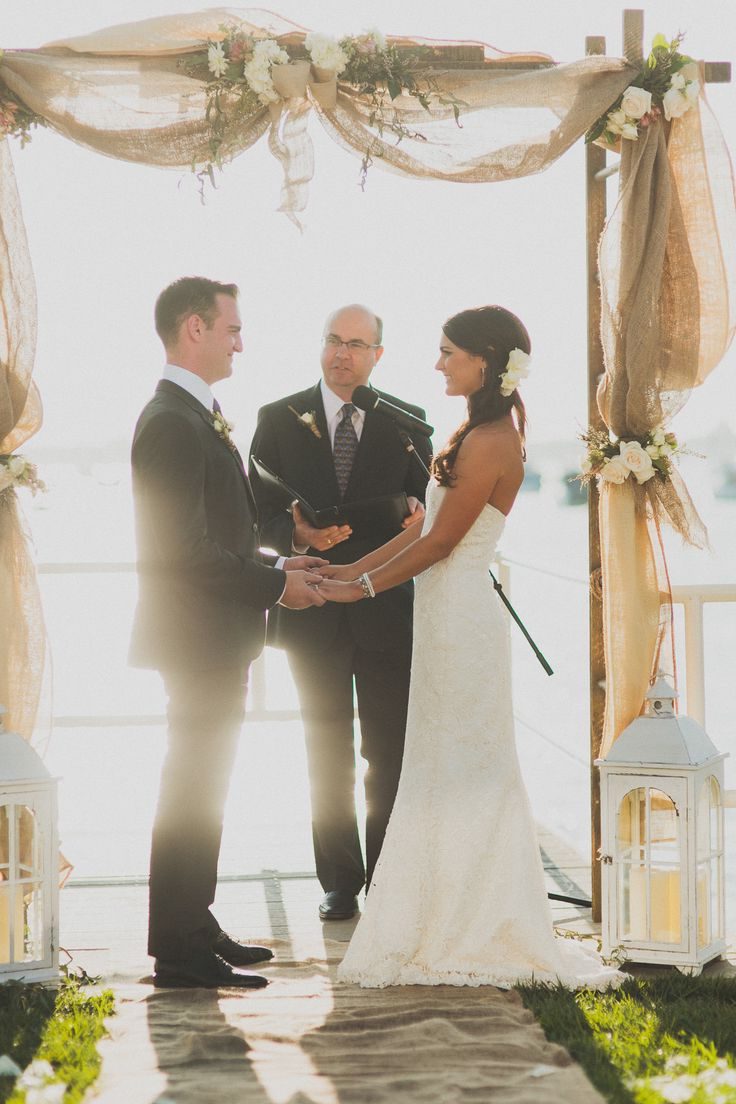 burlap wedding ideas - burlap and flower wedding arch