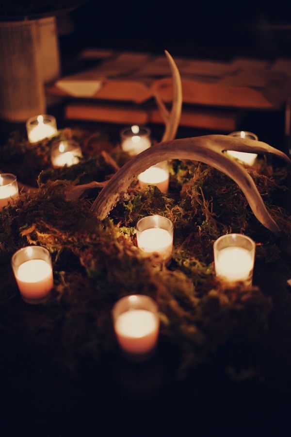 candels and antler wedding tablescape for rustic weddings