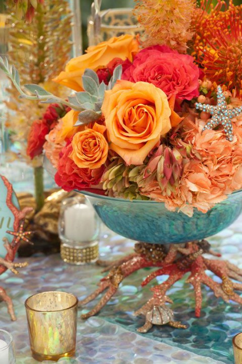 coral pink flowers wedding centerpiece for beach weddings