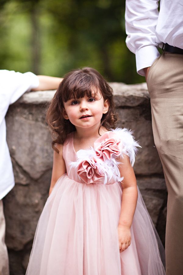 cute blush pink flower girl dress with feather