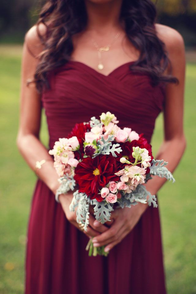 deep red bridesmaid dress and bouquet