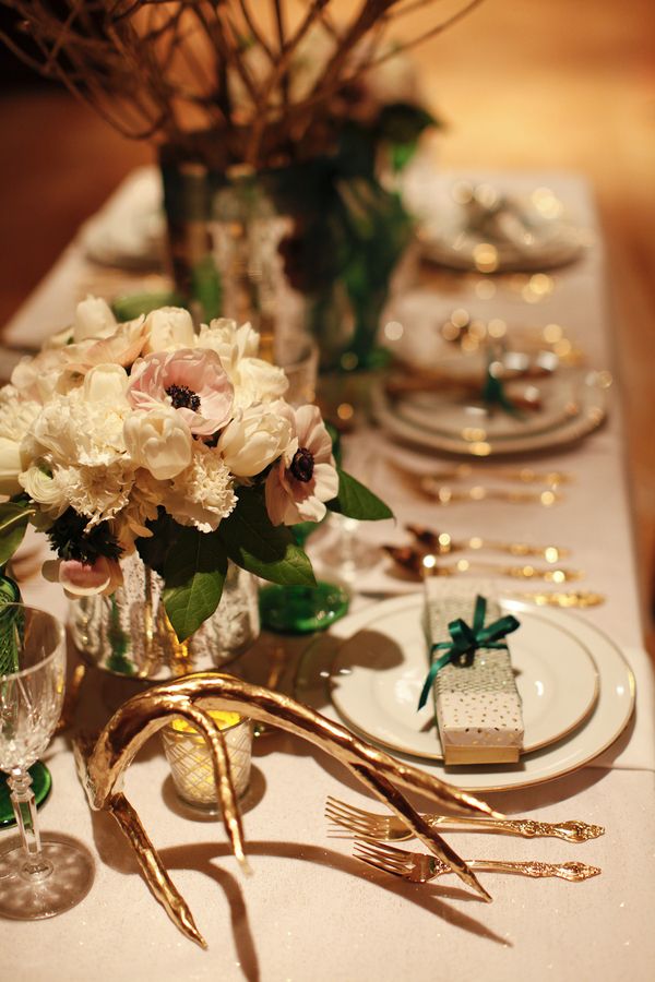 emerald white gold and touches of mercury glass and antler wedding table setting
