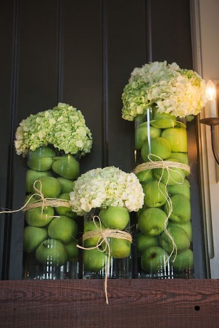 fall centerpiece- filling vases with green apple