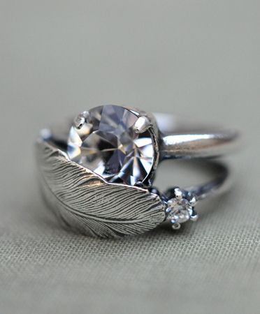 feather wedding band via 9 little known feather wedding ideas