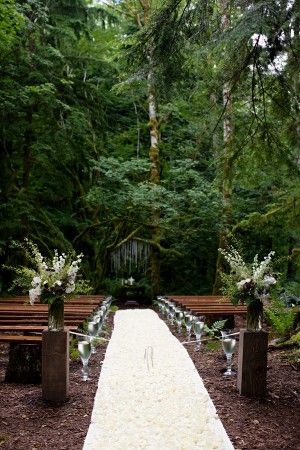 forest wedding with rustic benches
