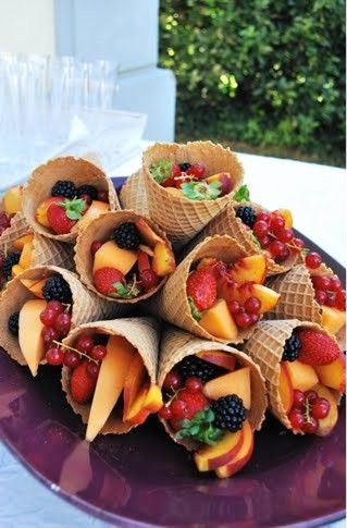 fruit salad served in waffle cones