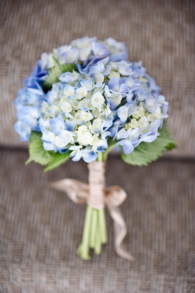 green and light blue hydrangea wedding bouquet
