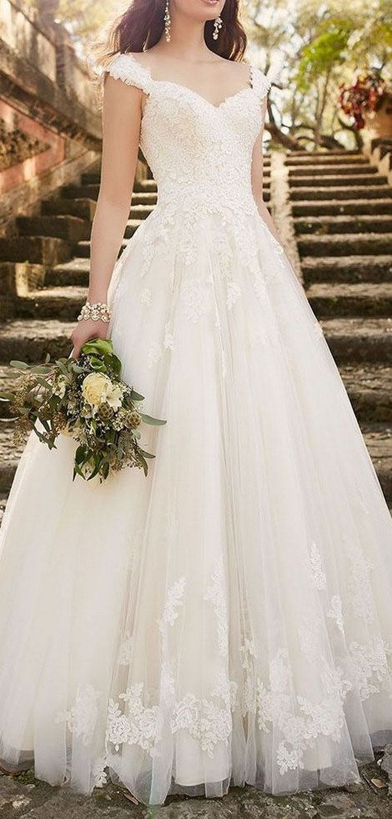 lace wedding dress with cap sleeves is an instant classic from Essense of Australia
