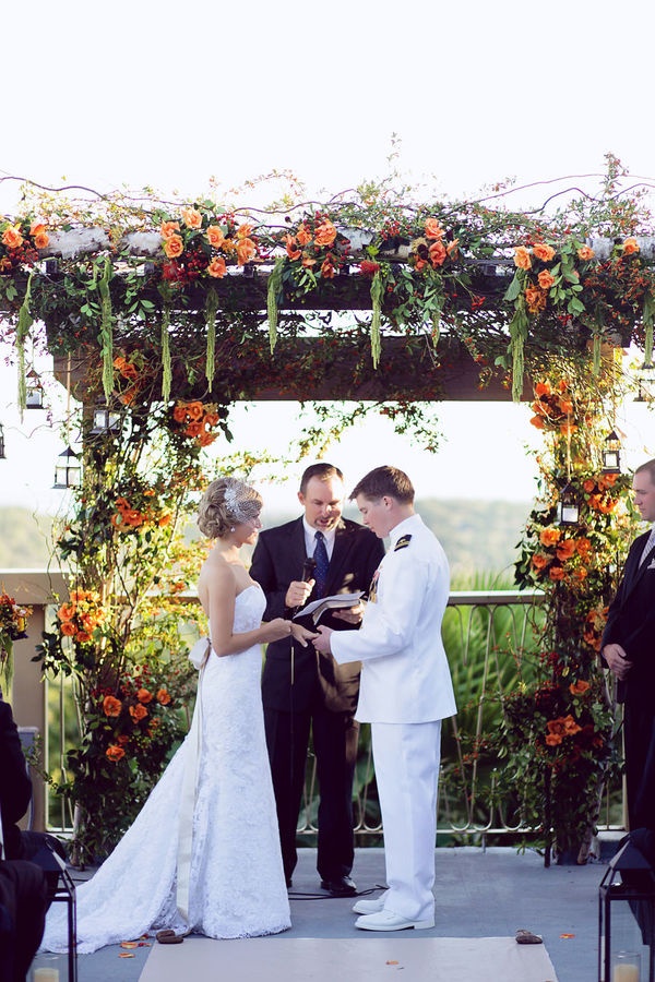 orange coral roses wedding alter for rustic fall weddings