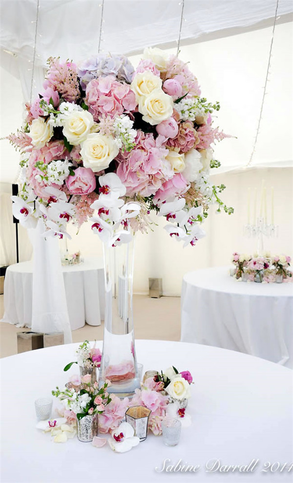 pastel floral tall centerpieces for a wedding
