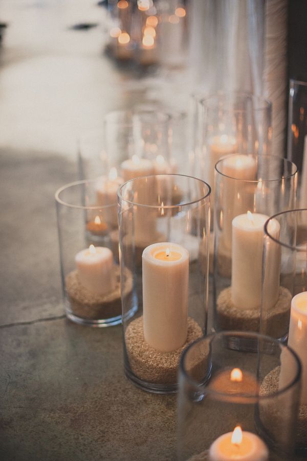 pillar candles in hurricane vases