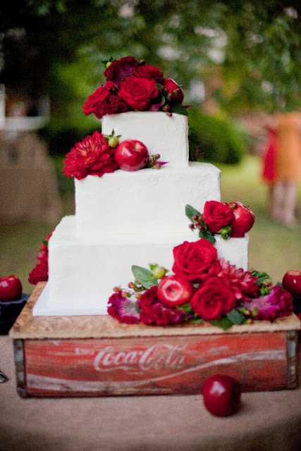retro, vintage wooden Coca-Cola crate looks great as a stand for this pretty red and white wedding cake