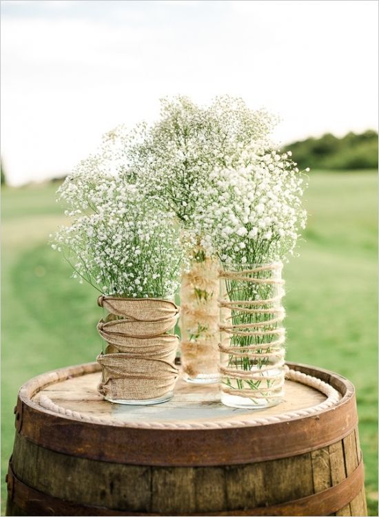 romantic rutsic wedding decor ideas - babys breath with burlap