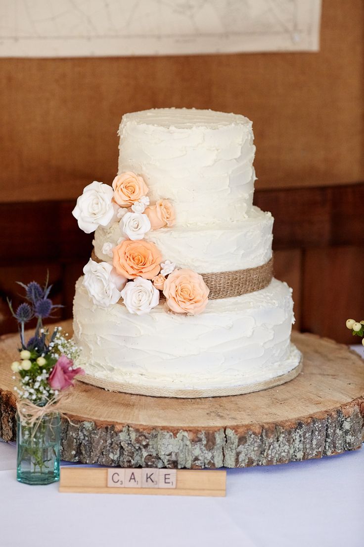 rustic burlap wedding cake and wood centerpiece