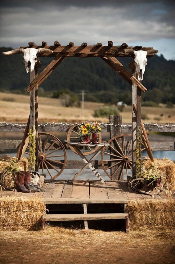 rustic country farm wagon wheels wedding arch