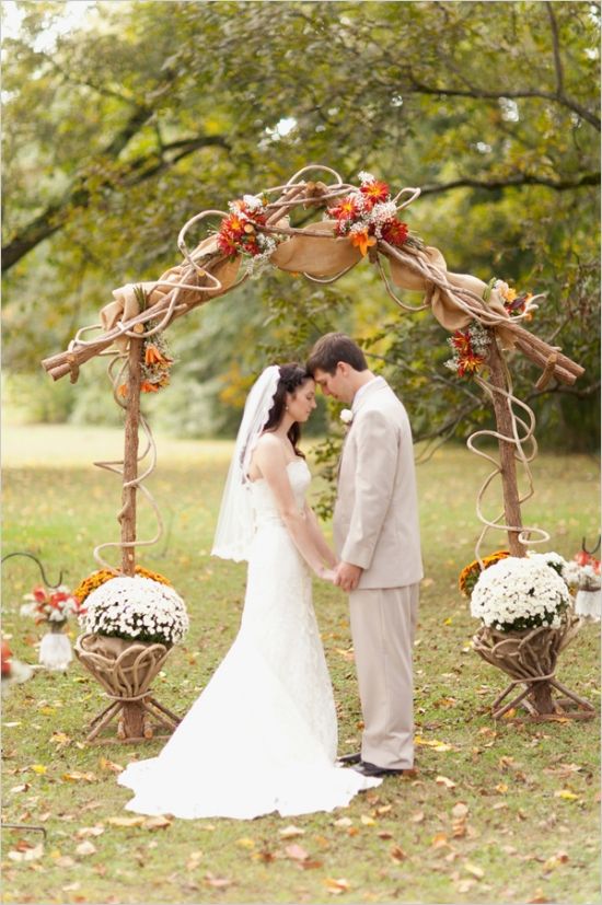 rustic outdoor wedding ceremony alter arch for fall wedding