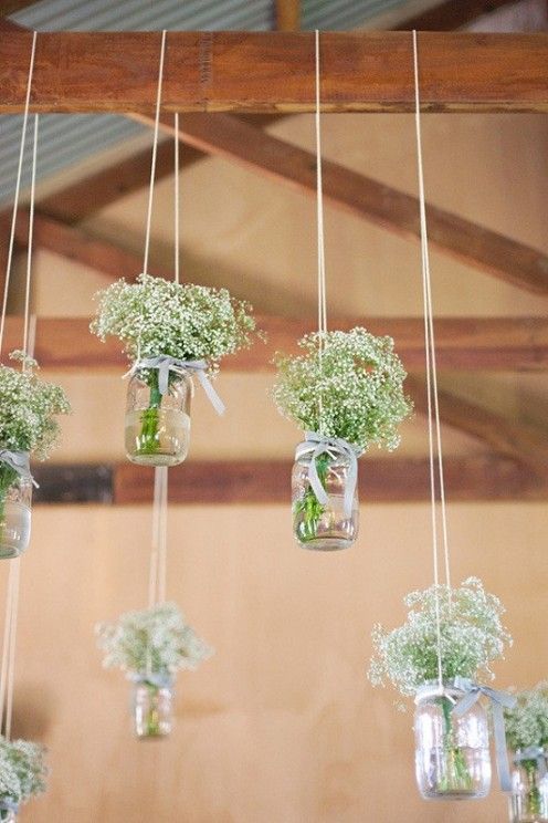 rustic wedding ideas- Baby Breath flowers in a wedding setting