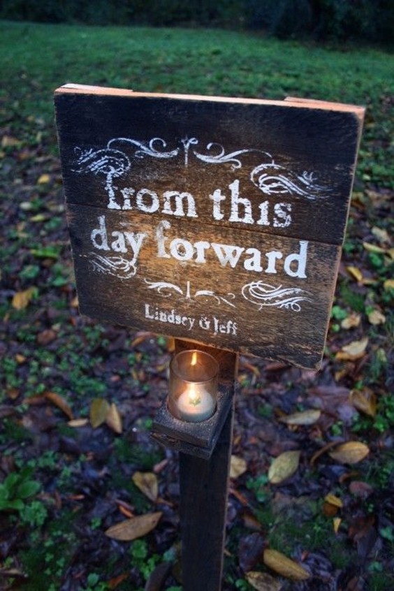 rustic wedding sign with candle