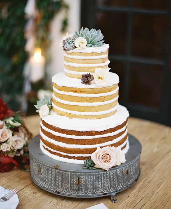 simple naked wedding cake with succulents