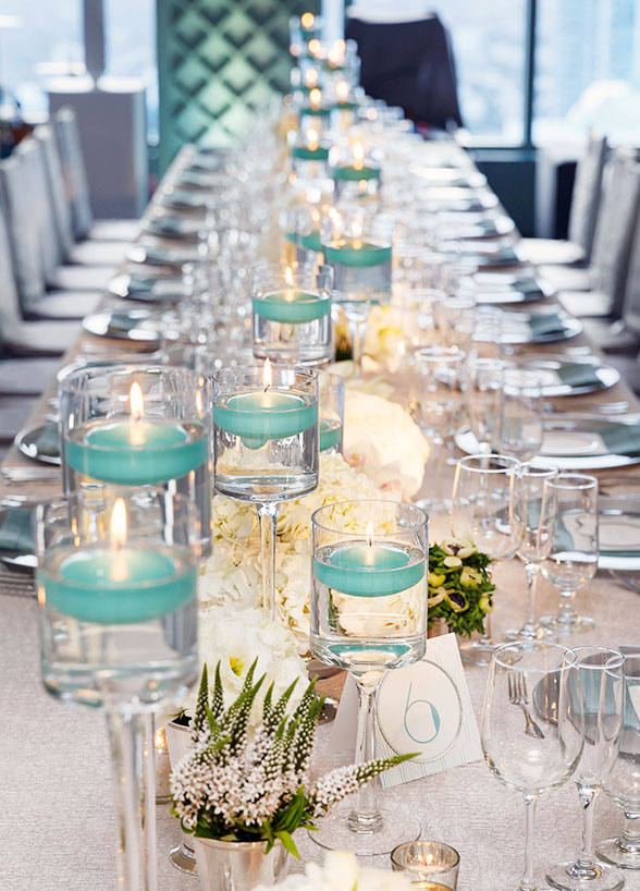 wedding centerpieces with flowers and candles