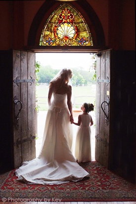 wedding photo ideas -bride and flowergirl at entry
