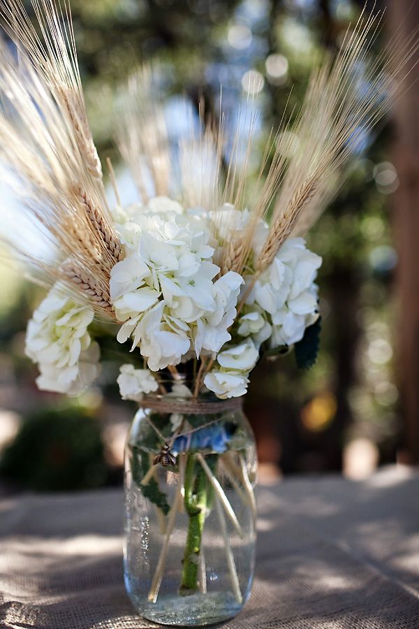 wheat and white flower autumn wedding centerpiece