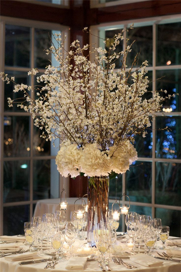 white floral and tree tall wedding centerpiece ideas