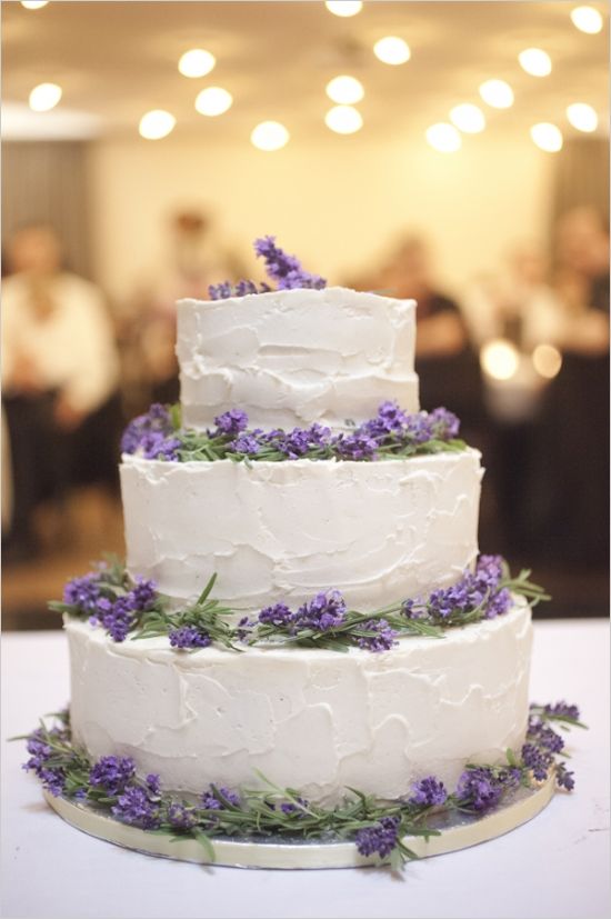 white wedding cake and lavender accents