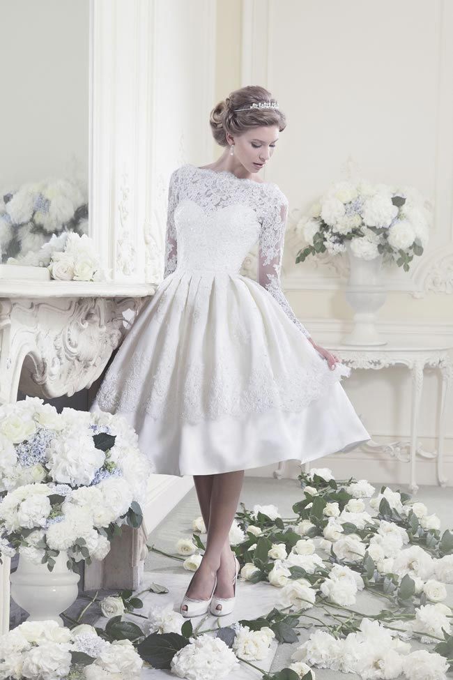 1950s-style tealength lace wedding dress with long sleeves