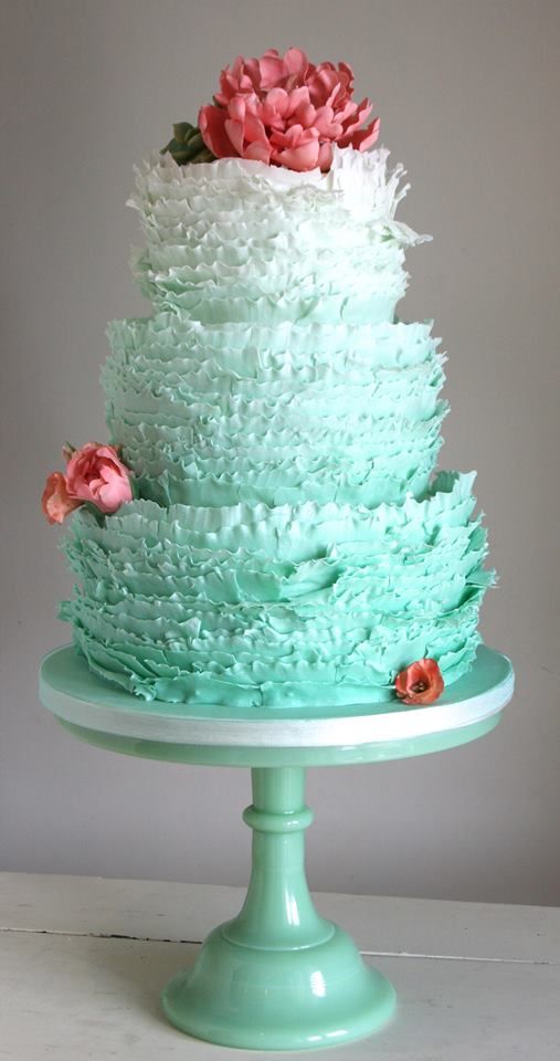 Aqua ombre ruffles wedding cake with pink sugar flowers
