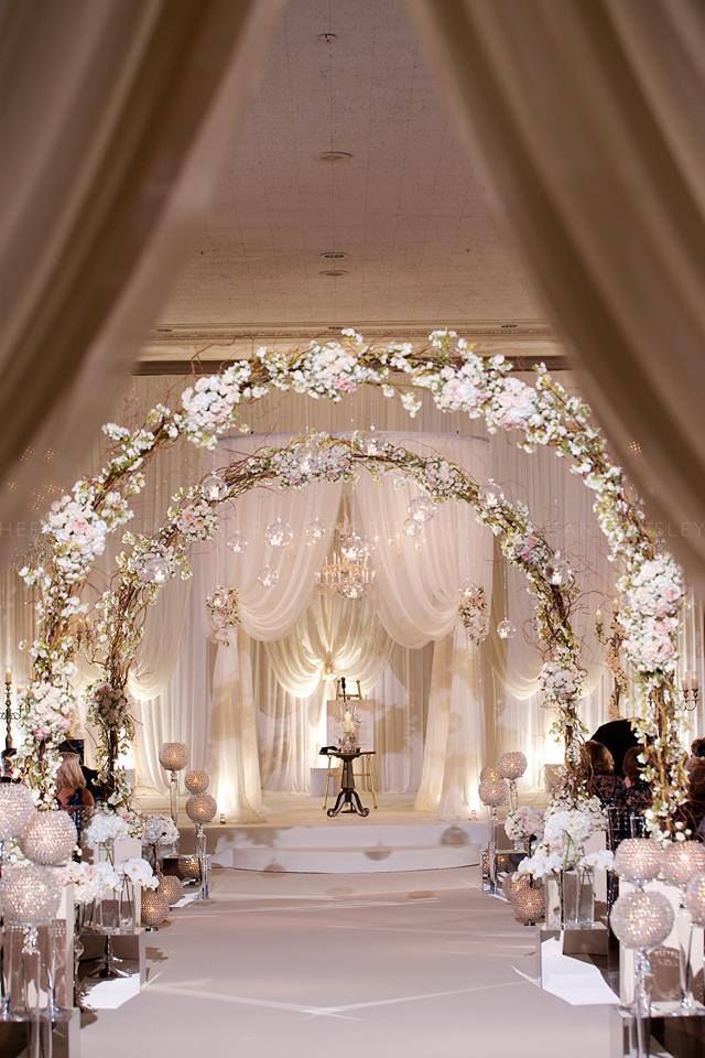 Beautiful archways welcome a bride down the aisle