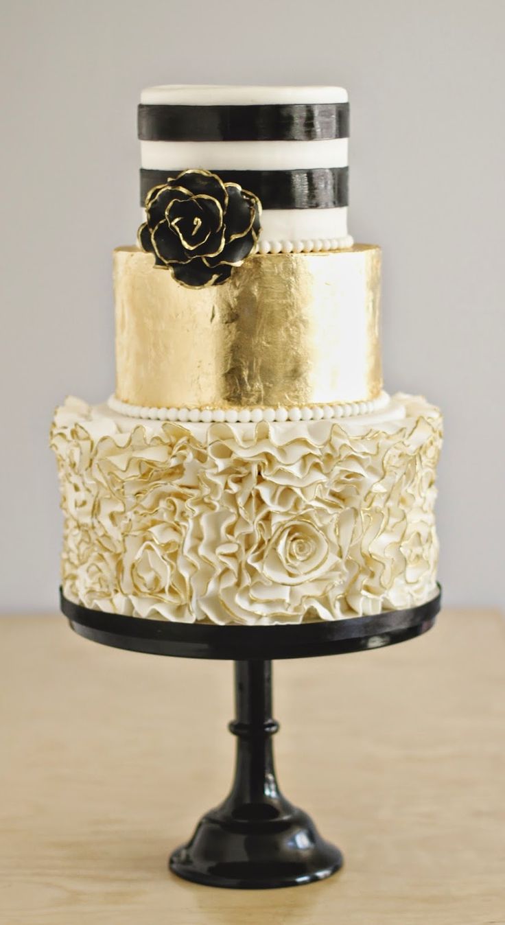 Black White and Gold Wedding Cake with Gold Ruffles