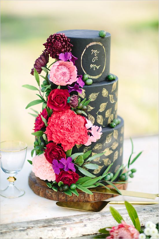 Black and gold wedding cake with sugar flowers by Cake by T Bakes