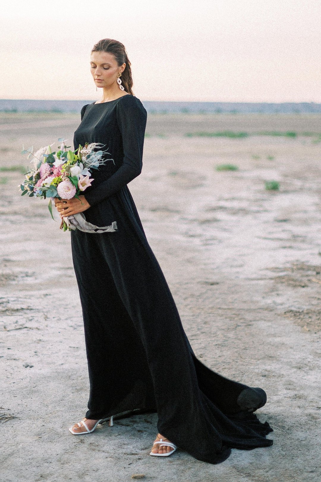 Black modest long sleeve wedding dress with high neck bodice