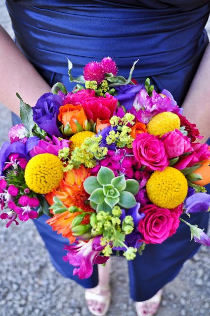 Colorful barn wedding bright bridal bouquet with yellow billy balls and succulents