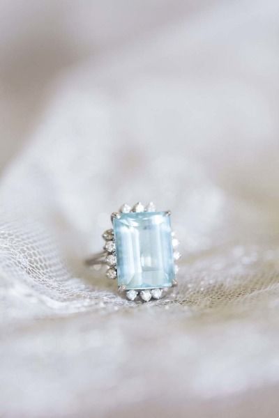 Emerald cut aquamarine & french cut blue diamond engagement ring