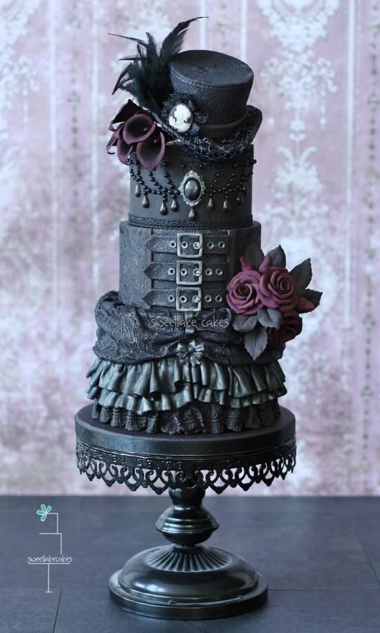 50+ Awesome and Unique Steampunk Wedding Ideas 2024 20 Gothic black wedding cake with top hat