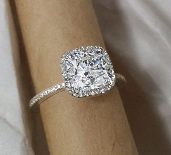 Halo engagement ring cushion cut