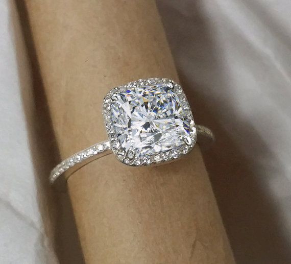 Halo engagement ring cushion cut