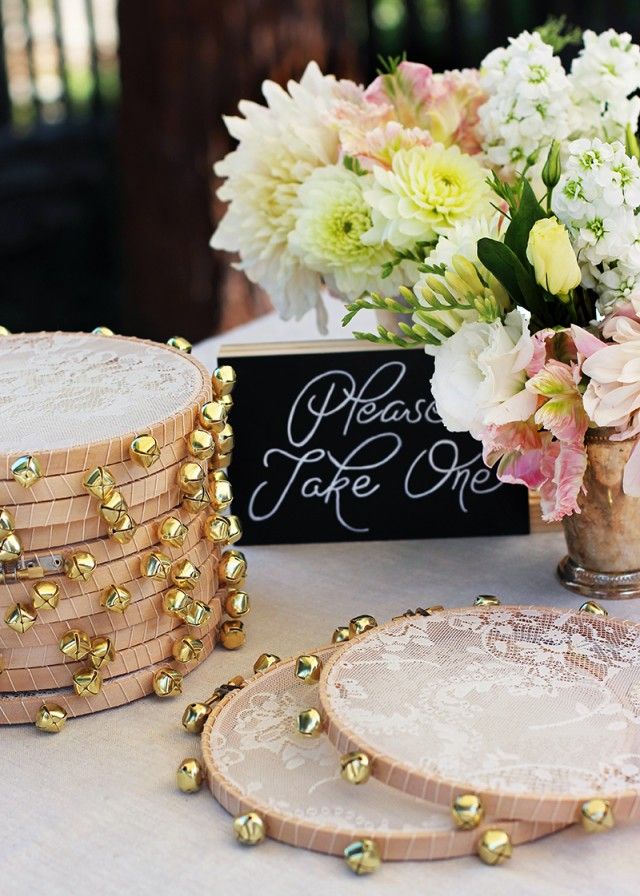 Handmade lace-tambourine favors welcome wedding guests on the sweetest note