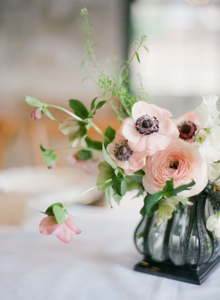 Pink ranunculus and anemones wedding centerpiece