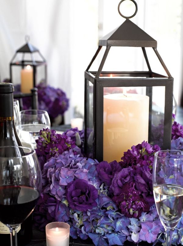 Purple hydrangea candle lit lantern wedding centerpiece