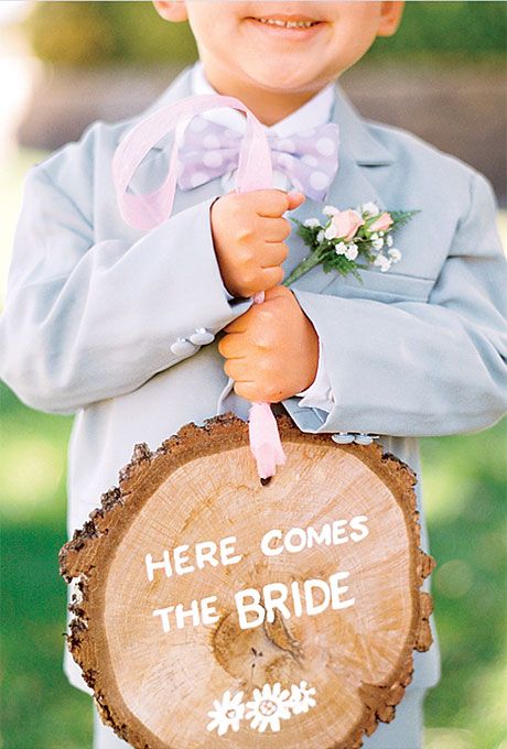 50+ Tree Stumps Wedding Ideas for Rustic Country Weddings 29 Ring Bearer and signs on tree stump