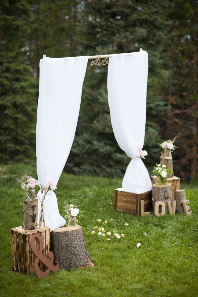 Simple Rustic Tree Stump Wedding Altar