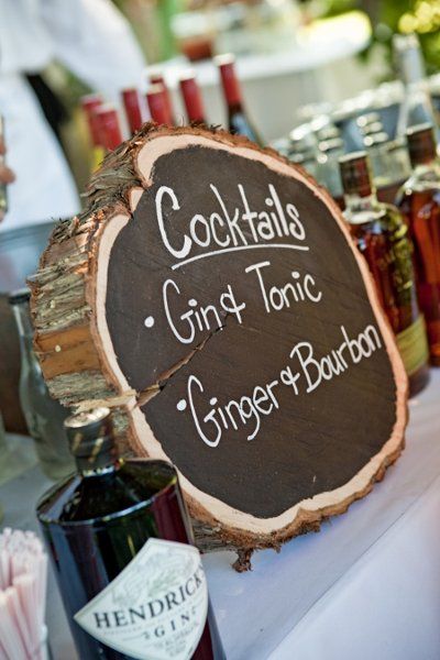 50+ Tree Stumps Wedding Ideas for Rustic Country Weddings 23 Specialty Drinks Displayed on a Painted Tree Stump