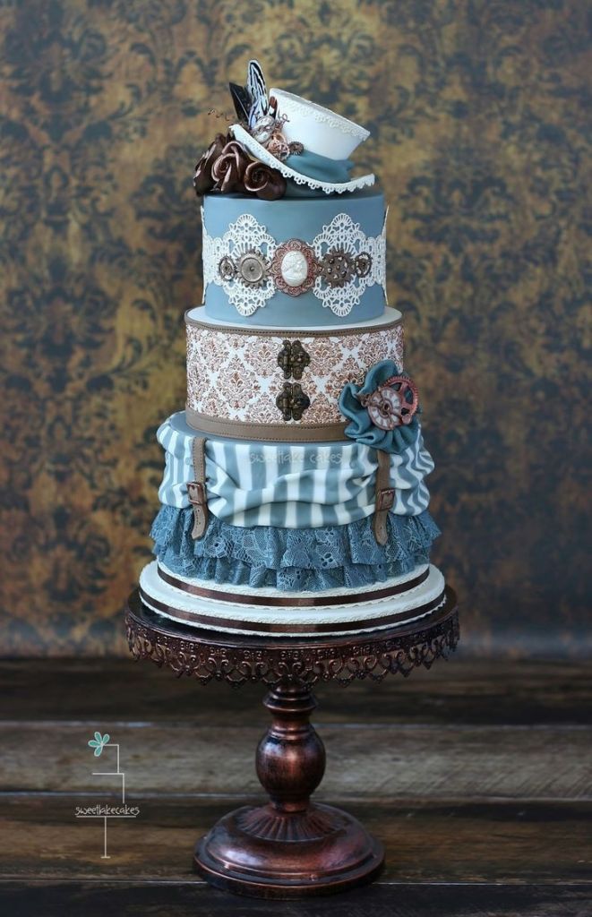 Steampunk blue and white lace wedding cake