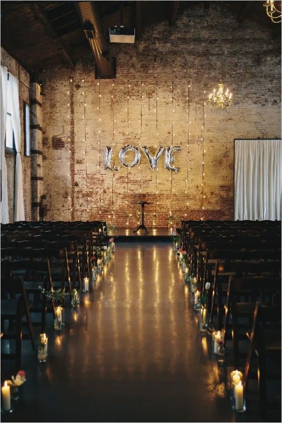 Stunning and romantic lighted ceremony backdrop