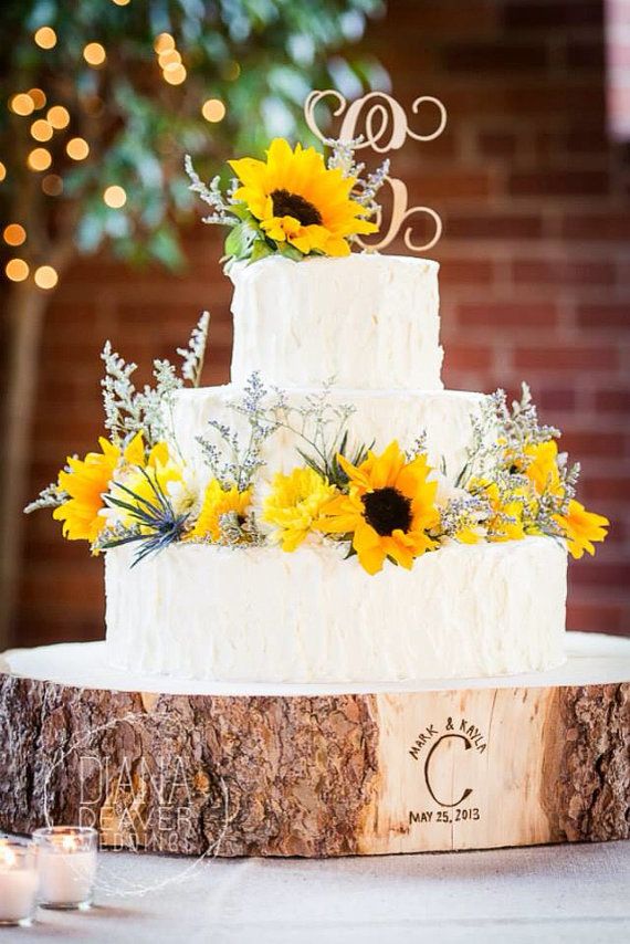Sunflower Wedding Cake with Wood Tree Slice Wedding Cake Base