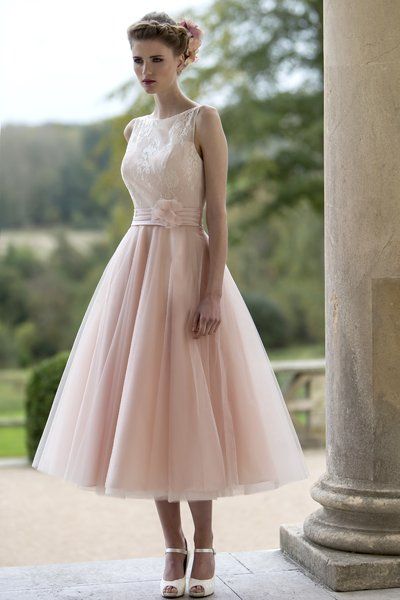 Tea length wedding dress with delicate lace bodice and sheer neckline and full Tulle Fifties style skirt